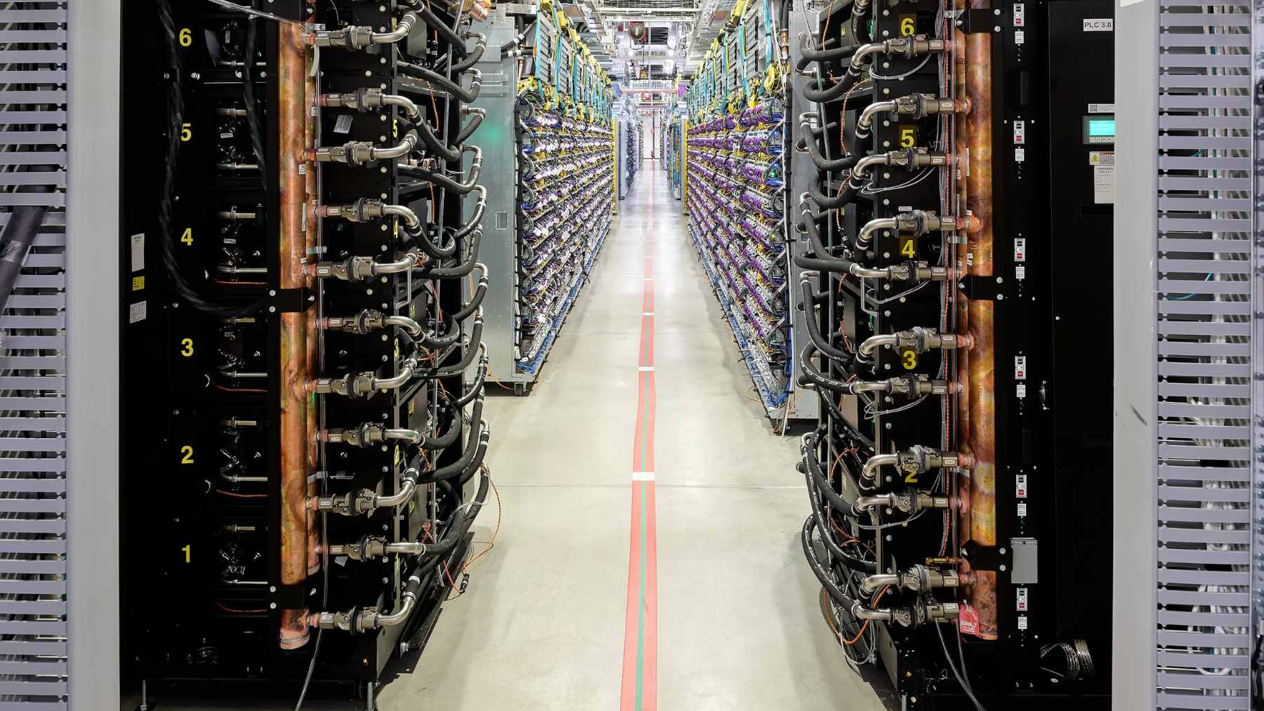 High-performance AI server racks in a secure data center facility, representing the technology at the center of the DOJ export control case.