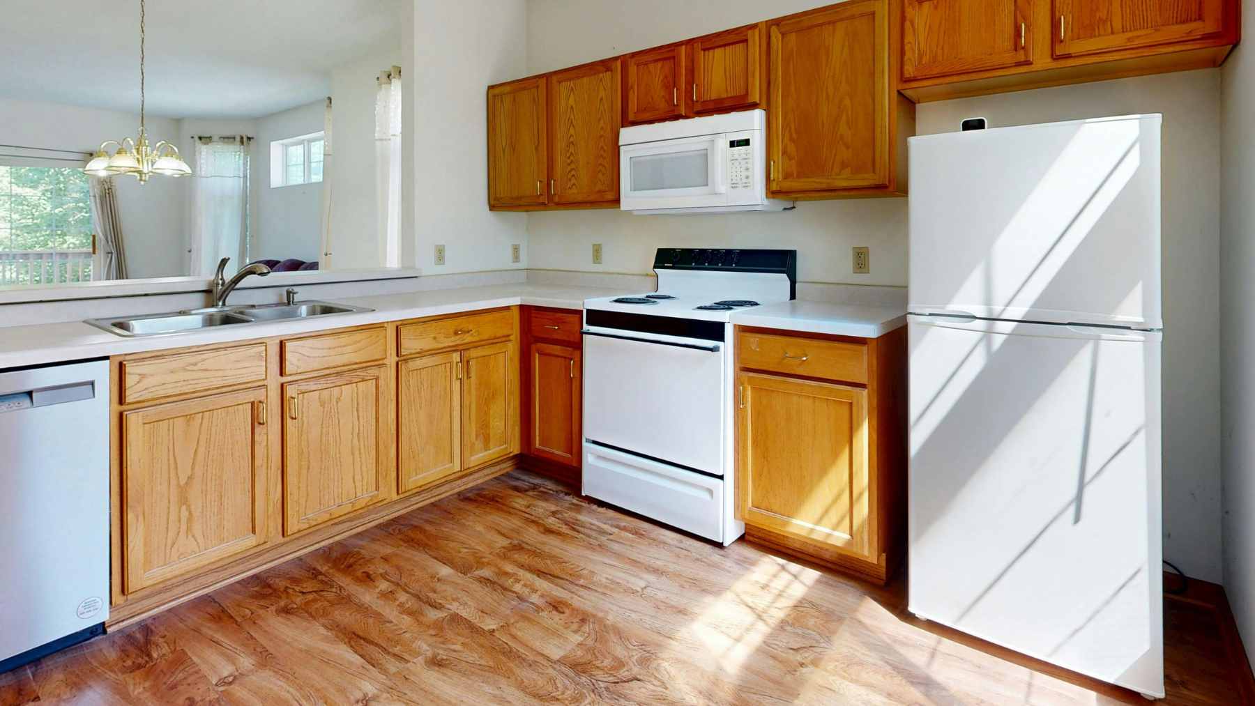 A close-up of an illuminated electric oven interior with heating elements glowing red, representing high wattage energy consumption.