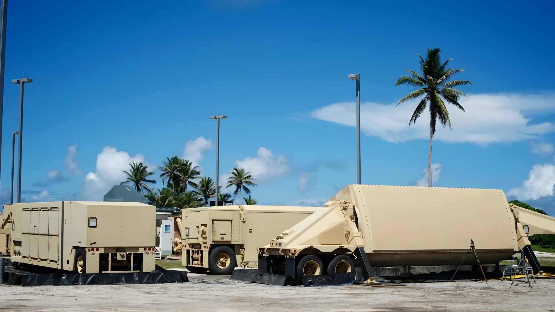 Satellite imagery showing the damaged perimeter of a high-altitude missile defense radar station in the Middle East.