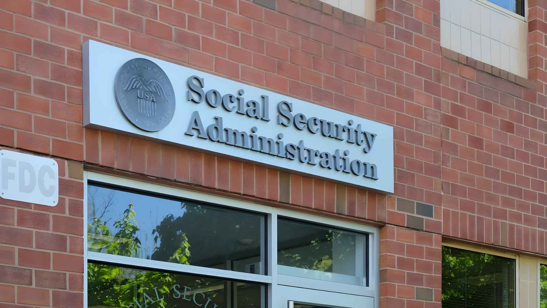Social Security Administration office building with the agency name on the front, representing upcoming changes to SSA scheduling and service.