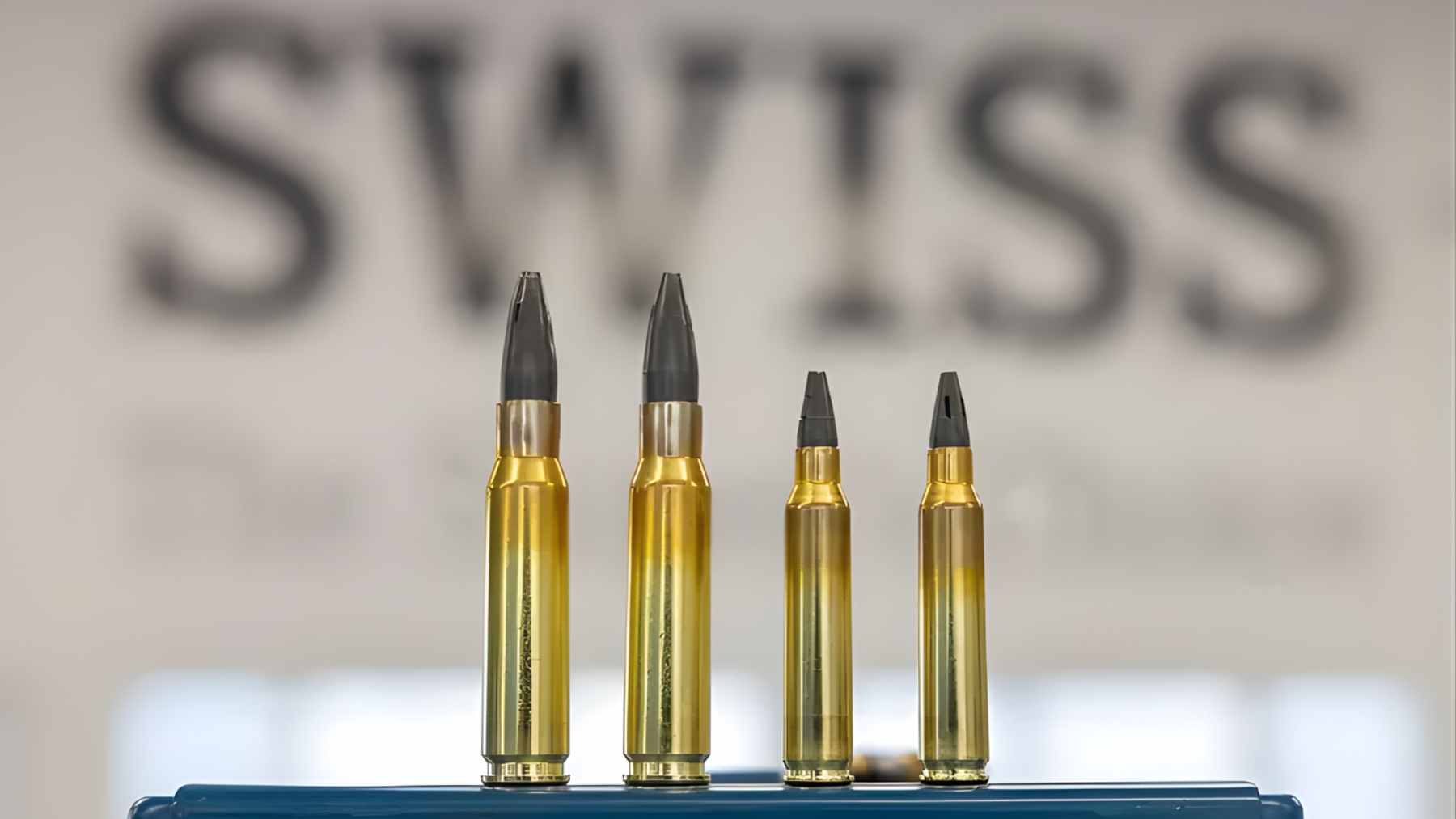 A Swiss manufacturing facility producing ammunition and armored vehicle components for European defense exports.