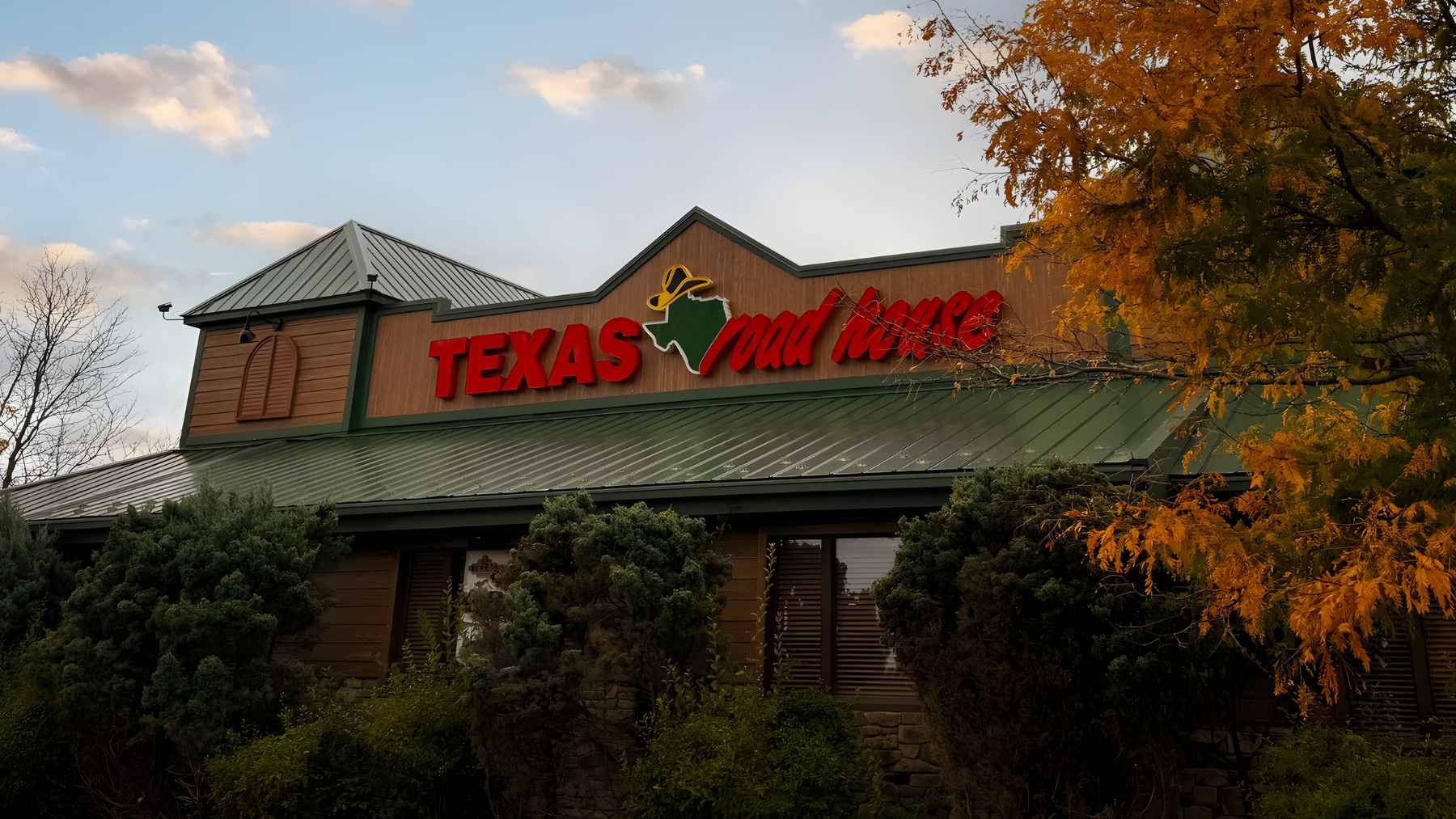 A retired man sitting alone in a quiet living room, reflecting on the transition from a busy career to a sedentary lifestyle.