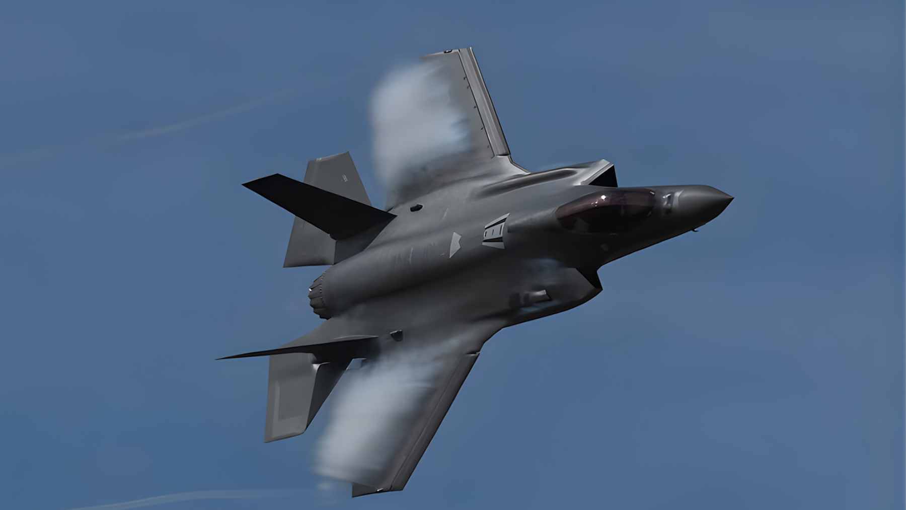 A high-tech laboratory technician inspecting a rare earth magnet used in advanced military radar and missile guidance systems.
