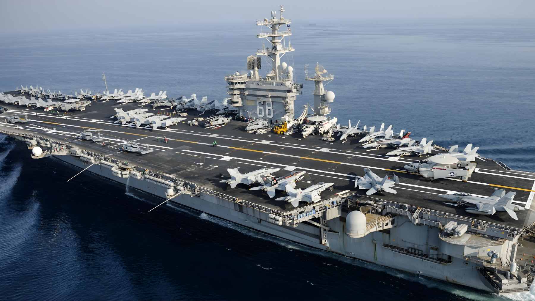 The aircraft carrier USS Nimitz (CVN 68) departing Naval Base Kitsap-Bremerton for its final homeport shift.