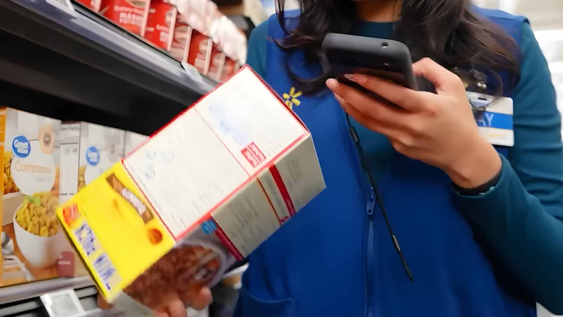 A variety of Walmart Great Value brand grocery products, including milk, cereal, and snacks, displayed on a wooden table.