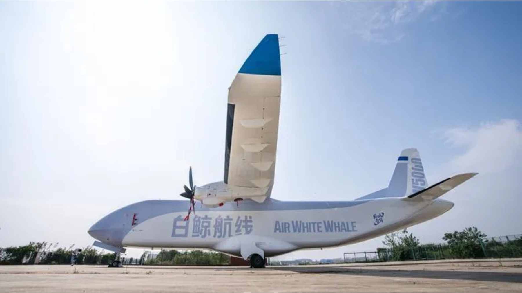 A large, unmanned cargo aircraft taking off from an airfield in China, powered by a hydrogen turboprop engine.