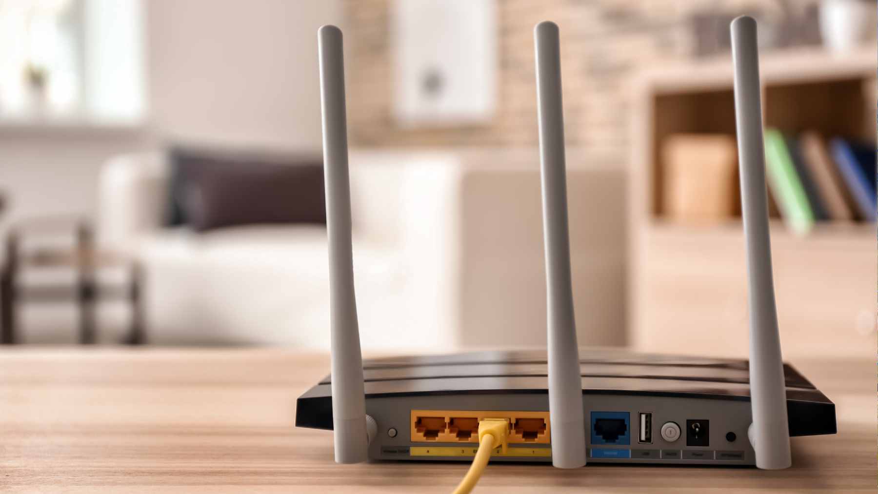 A futuristic network visualization showing beams of laser light rapidly transmitting data packets across a dark room.