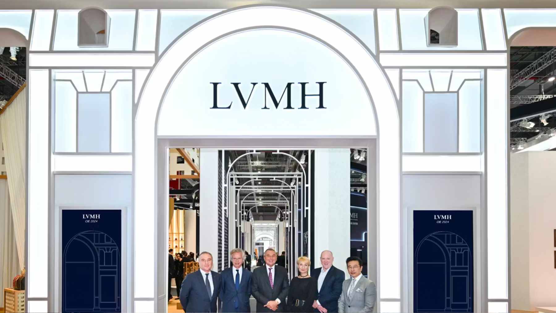 An upscale luxury fashion boutique sitting completely empty during regular shopping hours.