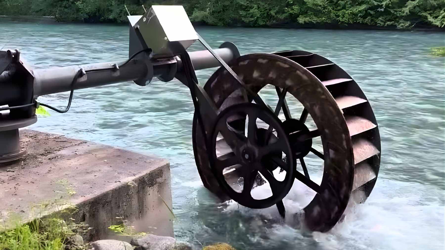 A modern, custom-built water wheel spinning in a fast-flowing river, connected to an electrical generator box.
